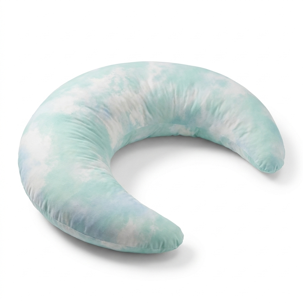 Cloud Pillow™ crescent-moon body pillow in soft mint cloud print