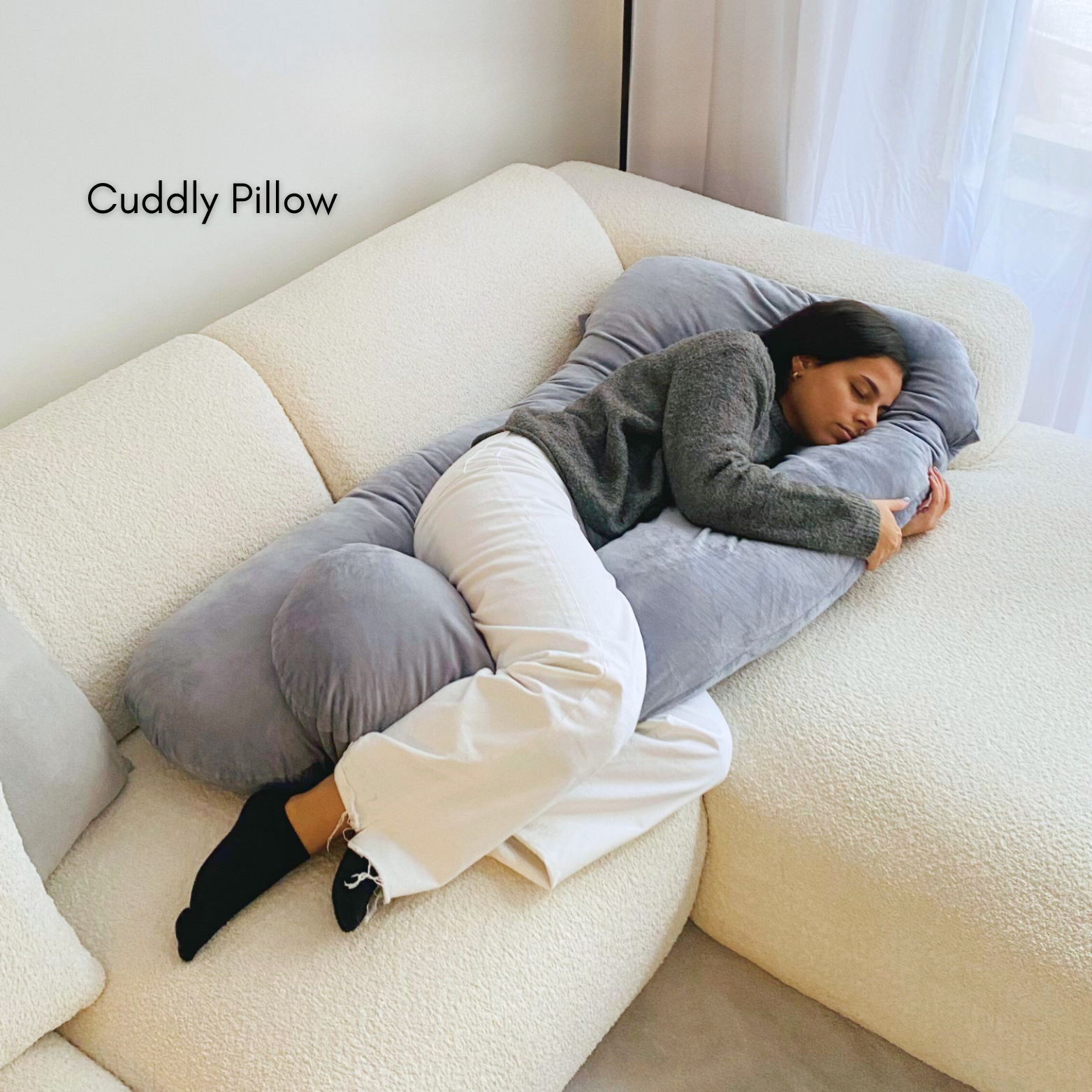 Woman sleeping on the Cuddly Pillow™ from the Comfy Wifey Set™