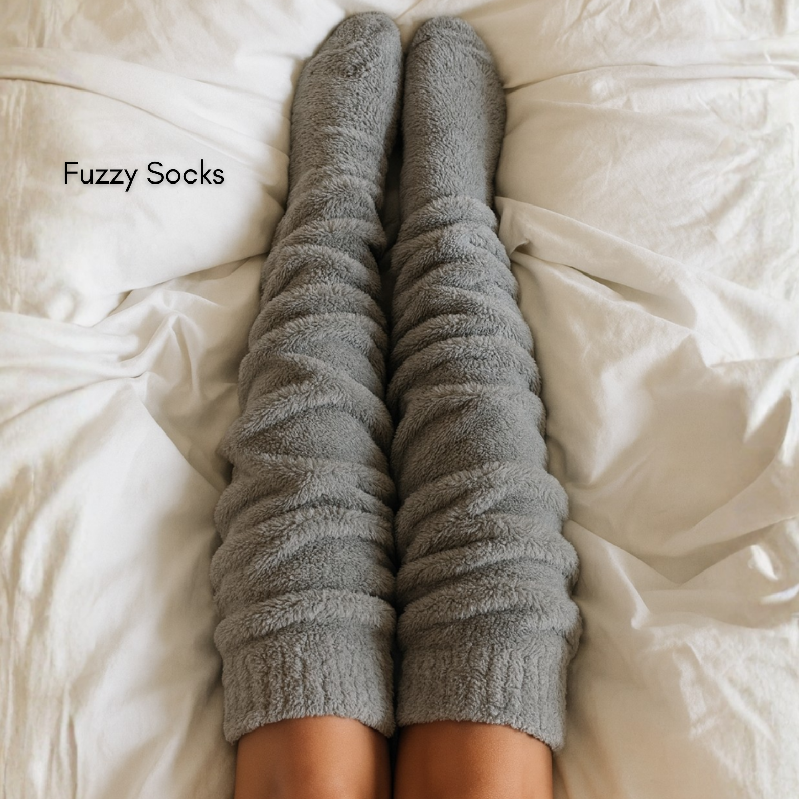 Grey Fuzzy Socks™ from the Comfy Wifey Set™ worn in bed