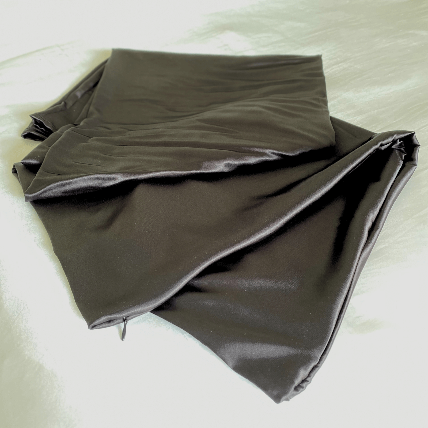 Folded black Cooling Silk Cover by The Snuggles