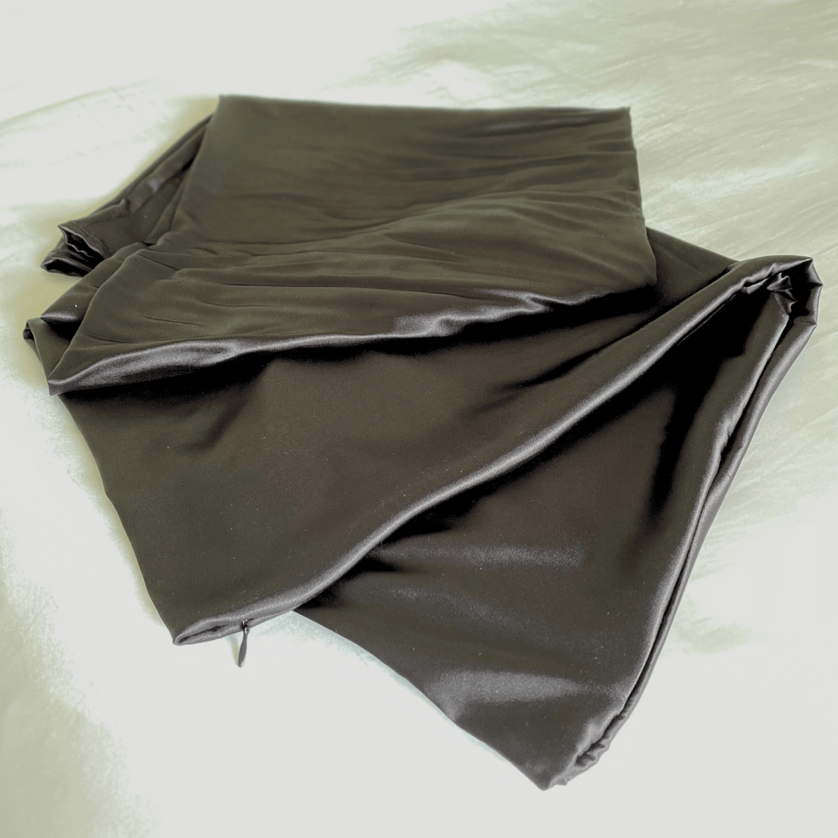 Folded black Cooling Silk Cover by The Snuggles