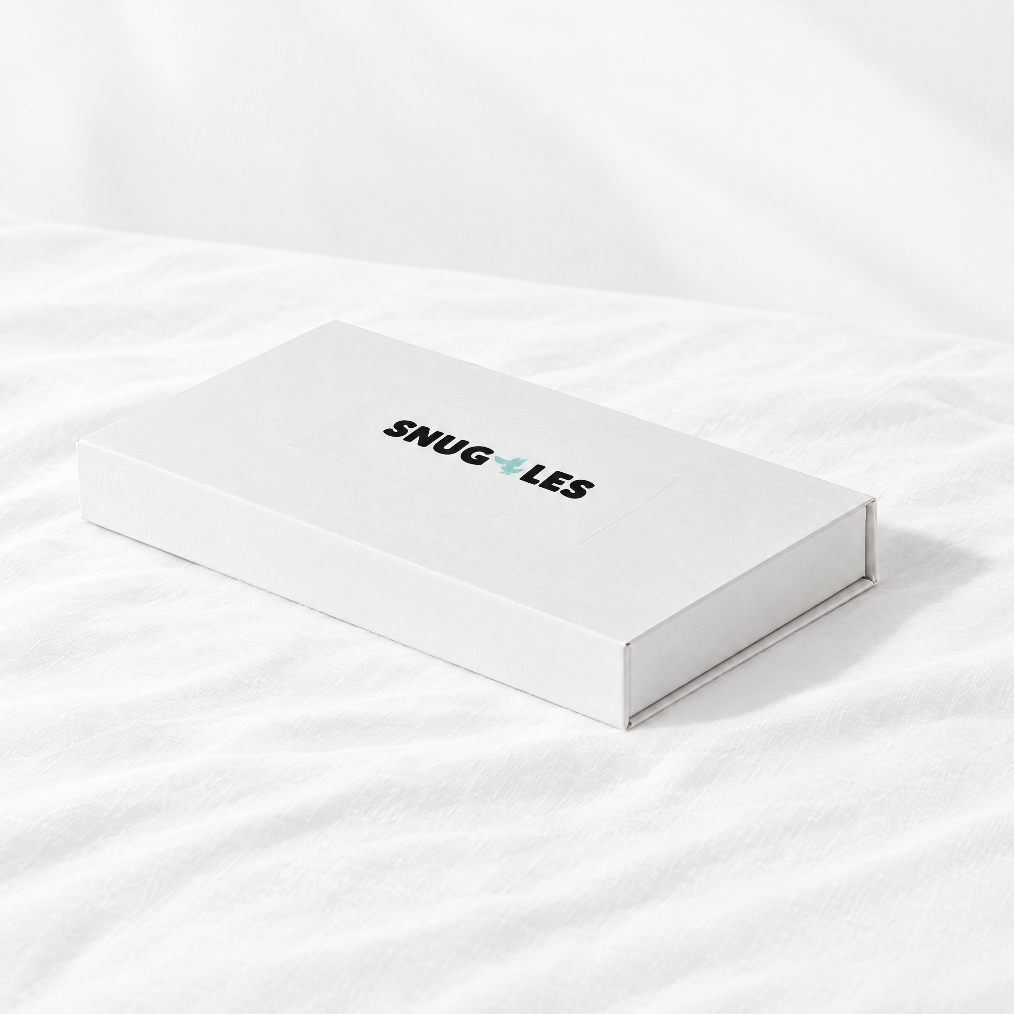 The Snuggles Silky Sleep Mask packaging box