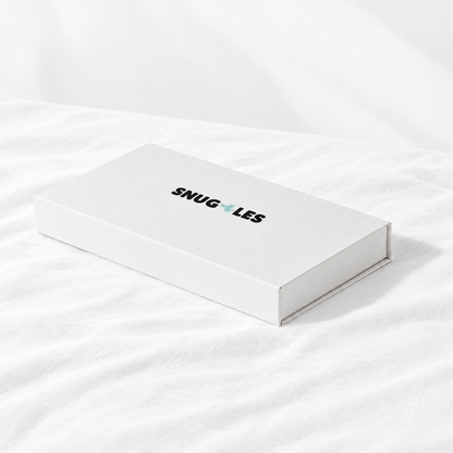 The Snuggles Silky Sleep Mask packaging box