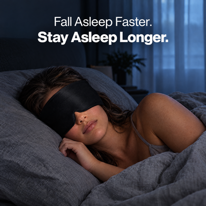 Woman asleep wearing The Snuggles Silky Sleep Mask: fall asleep faster, stay asleep longer