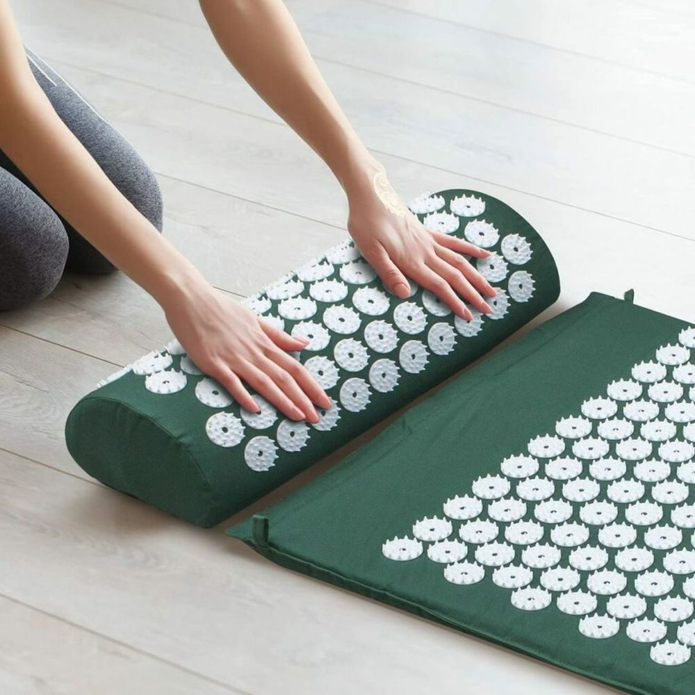 Tension Relief Mat acupressure pillow and mat unrolled on the floor