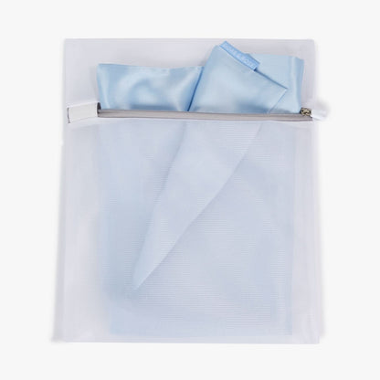 Washing Silk Bag by The Snuggles, white zip mesh laundry bag holding a silk cover