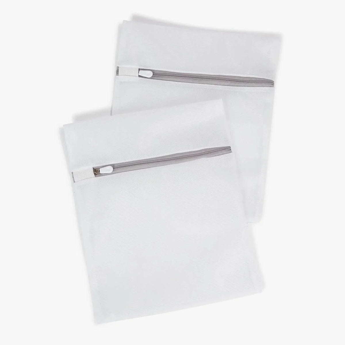 Two white zip mesh Washing Silk Bags by The Snuggles